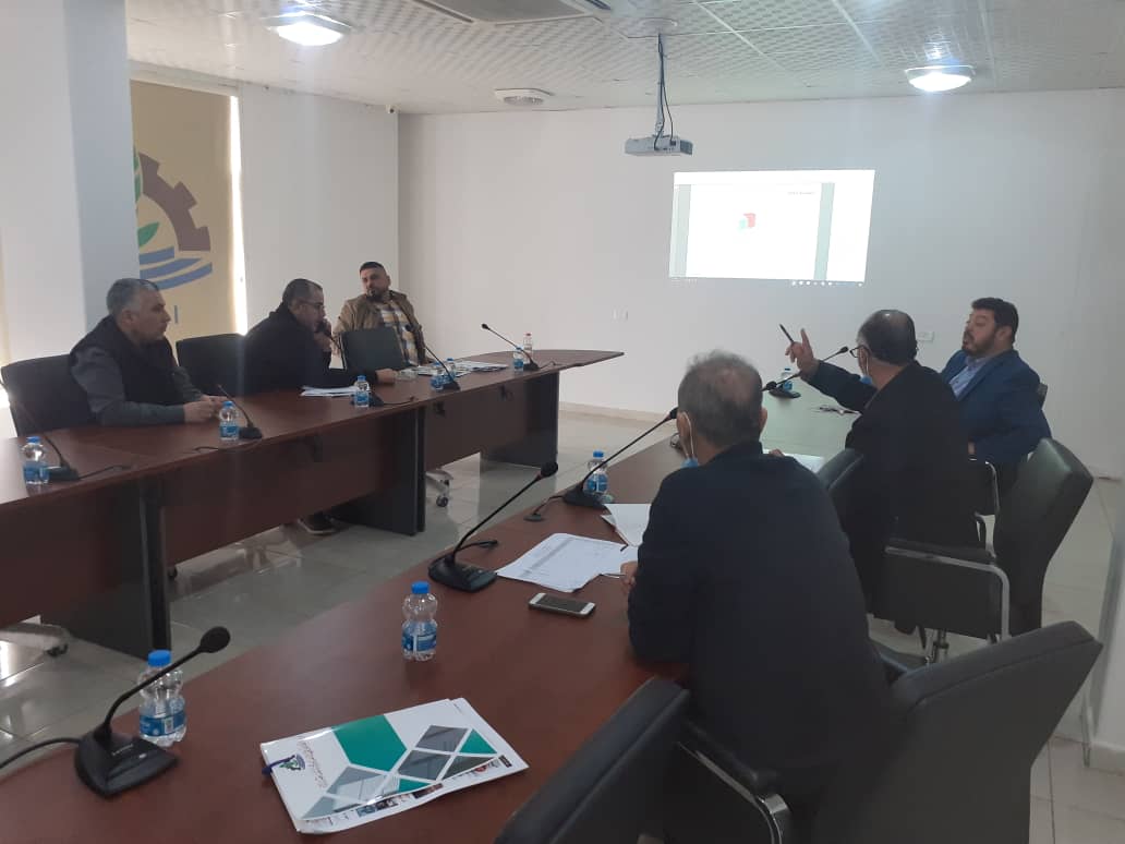 The committee supervising the design and construction of the new administrative building of Misrata chamber reviews a set of designs submitted for the tender